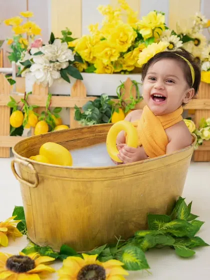 A big, happy smile from the tub. The combination of the warm bath and fun toys always brings out the best expressions.