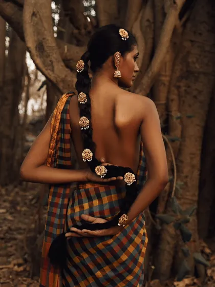 Capturing a story of tradition and nature for an editorial shoot. I used the earthy tones of the forest and the soft light of dusk to create a serene, painterly quality that feels both timeless and authentic.