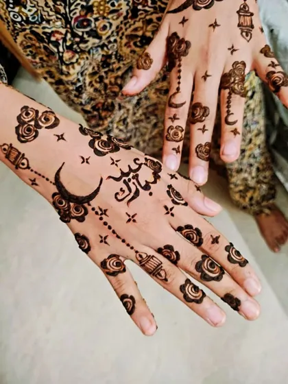 Getting ready for Eid with this special design. I love incorporating celestial elements like moons and stars, along with hanging lanterns and floral patterns, to capture the festive spirit. The "Eid Mubarak" calligraphy adds a personal touch.