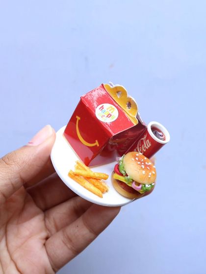 A close-up of a miniature Happy Meal, a fun and nostalgic piece.