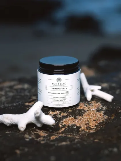 Another view of the Happy Feet Foot Salve. Its formula is designed to deeply moisturize without feeling greasy, sealing in hydration while you sleep.