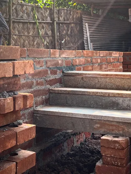 A detail of the brick and laterite foundation work at Aadi Villa. We are recalibrating traditional building techniques for contemporary use, focusing on sustainability and local craft.