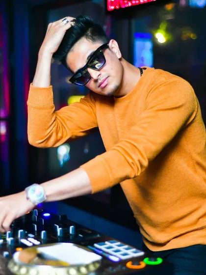A candid shot while mixing. My focus is always on delivering the perfect track at the perfect moment.