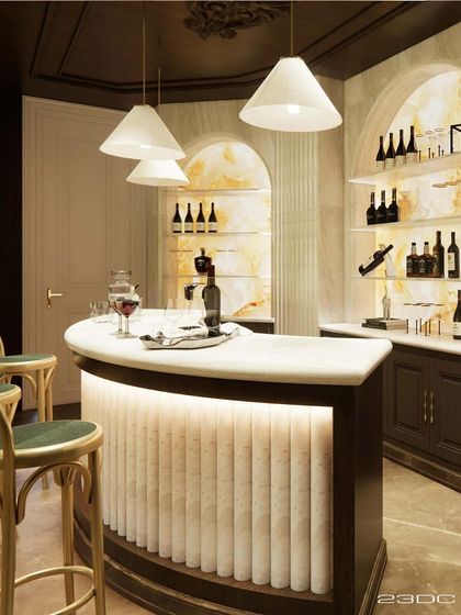 We designed this party area as a sanctuary of solid wood, draped in cozy dark tones. The bar features an onyx stone top and an elegantly curved, fluted base, with antique lighting casting a warm glow for intimate gatherings.