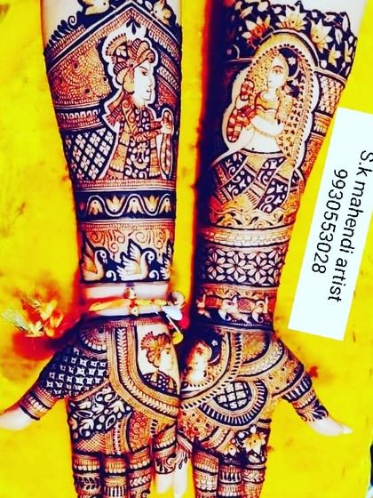 A vibrant design with portraits of the couple. The arms feature figures of Radha and Krishna, surrounded by peacocks and birds.