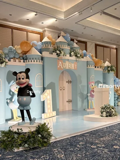 Another angle of the stage, this time featuring a classic Mickey Mouse cutout next to the illuminated number one.