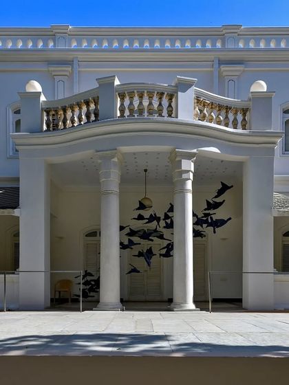 The restored facade of the Heritage House at the Kasturbhai Lalbhai Gallery. Our conservation work focused on meticulously repairing and preserving the original architectural details of this historic colonial-era mansion.