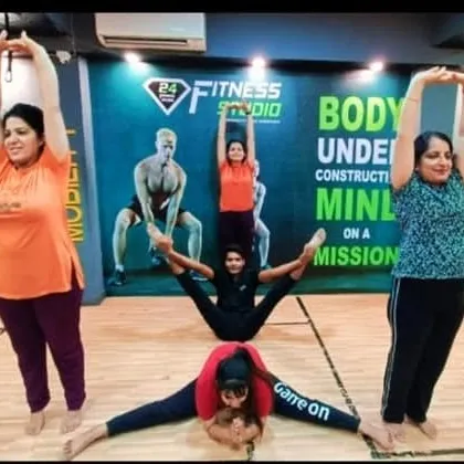 Having some fun and creating the word 'YOGA' with the group. My classes are not just serious; we always make time for creativity and enjoyment.
