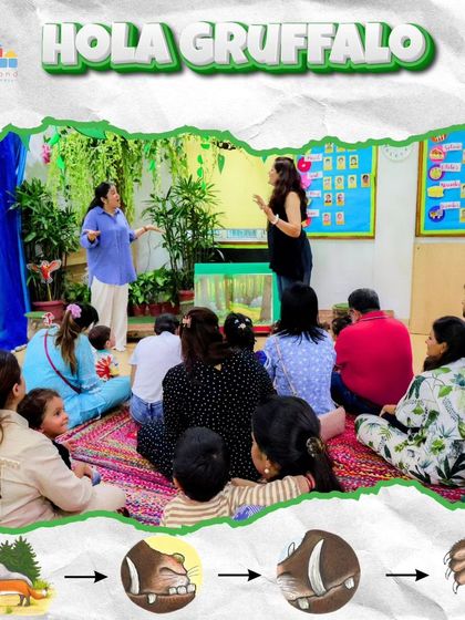 A group of parents and children listen intently during our "Hola Gruffalo" event. I use expressive storytelling to captivate the children's attention and draw them into the world of the book.