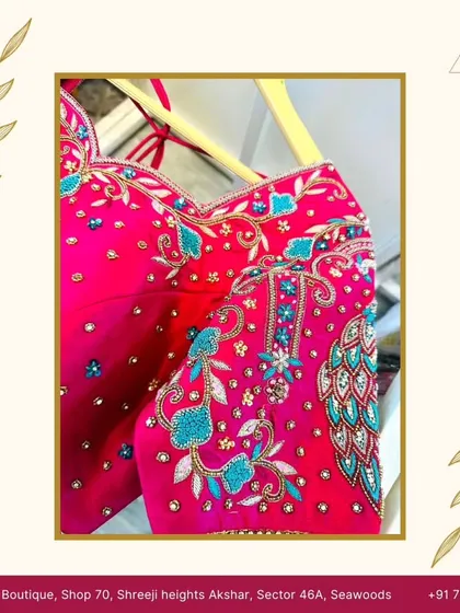 Another view of a custom bridal blouse, showcasing the detailed peacock motif embroidery on the sleeve. I love adding these personal, artistic touches to a bride's ensemble.