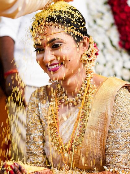 A close-up of Rakshita during the akshata ceremony, her makeup looking fresh and beautiful.