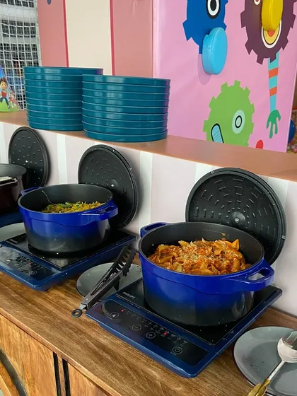 Our birthday party catering in action. We provide a full buffet setup with dishes like pasta and fried rice served in warmers, ensuring the food stays fresh and delicious for all your guests throughout the event.