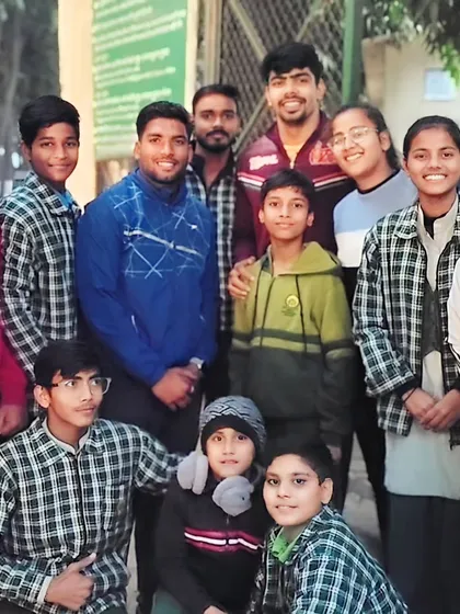 My team with the 'High Flyer' himself, Pawan Sehrawat, captain of the Indian Kabaddi team. Meeting their idols inspires them to dream big.