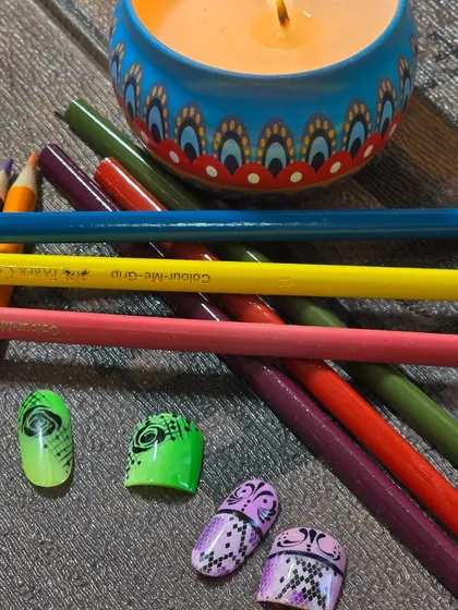 Matching nail and toe sets are a huge trend. Here are some abstract designs created by my students.
