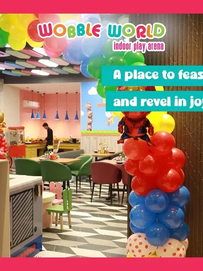 Our café area decorated for a party. It's a place to feast and revel in joy, with colorful balloons and a festive atmosphere.