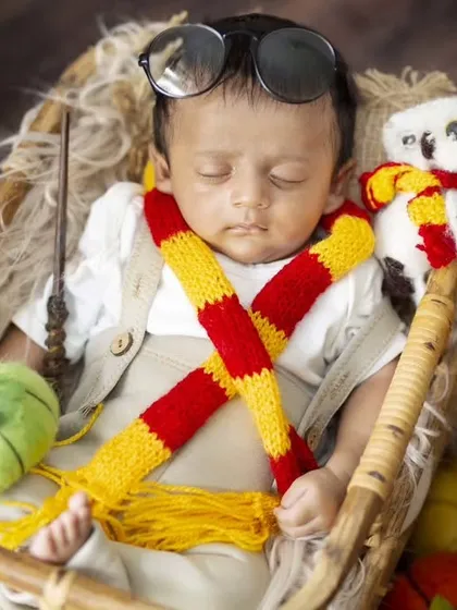 For all the Potterheads, this detailed Harry Potter newborn setup includes books, pumpkins, and even a tiny Hedwig.