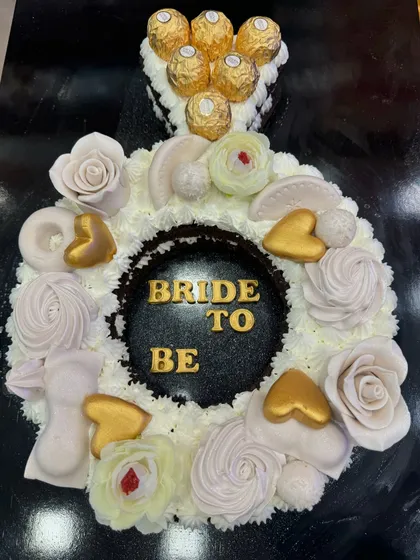 Another look at my popular 'Bride to Be' engagement ring cake. The design is both elegant and fun, perfect for celebrating the future bride at her bachelorette party or bridal shower.