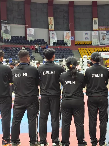 The back of our team's tracksuits, proudly displaying 'DELHI'. We don't just represent our academy; we represent our state on the national stage.