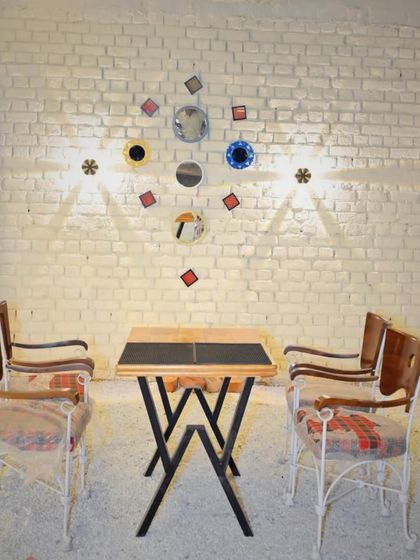 This quirky wall decor and seating area is another example of the unique design touches you'll find throughout the cafe.