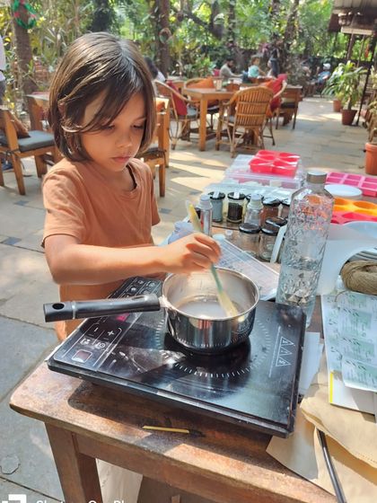 River was a natural, carefully stirring his soap base like a pro. Our stations are designed to be safe and easy for everyone to use, including kids.