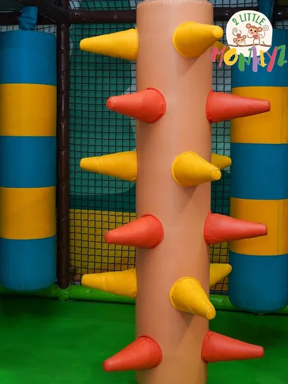 We've designed our climbing structures to be both fun and challenging. This padded climbing pole helps kids build strength and confidence as they navigate through the jungle gym. All surfaces are soft and safe for play.
