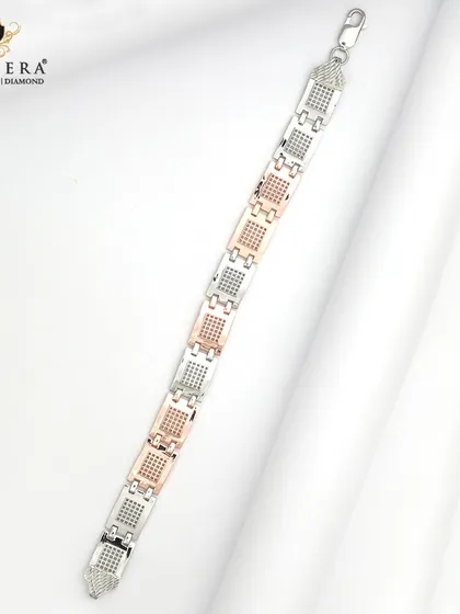 A modern two-tone men's bracelet in silver and rose gold with geometric, textured links. This piece shines with every move and is perfect for the fashion-conscious man.