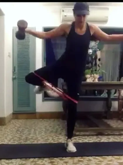 I encourage my runners to step up and lead. Here, one of our runners demonstrates a stability and strength workout for the group. It's about building confidence and sharing knowledge within the community.