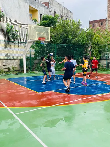 A player attempts a shot in the paint.