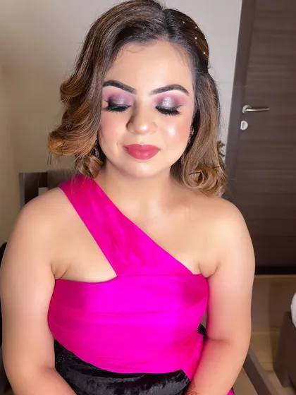 The eyes have it. For this cocktail look, I focused on a blended, shimmery eyeshadow to make her eyes pop. The rest of the makeup is kept clean and glowing to balance the look.