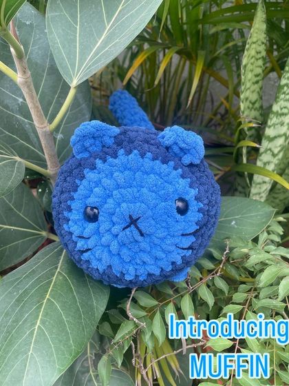 Hello, I'm Muffin the loaf cat! I'm a round, squishy, and very cute amigurumi cat. I can be made in any color combination you like, just place an order to get your own custom Muffin.