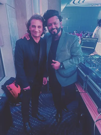 Posing with my brother Samir Dhrolia after a successful wedding gig.