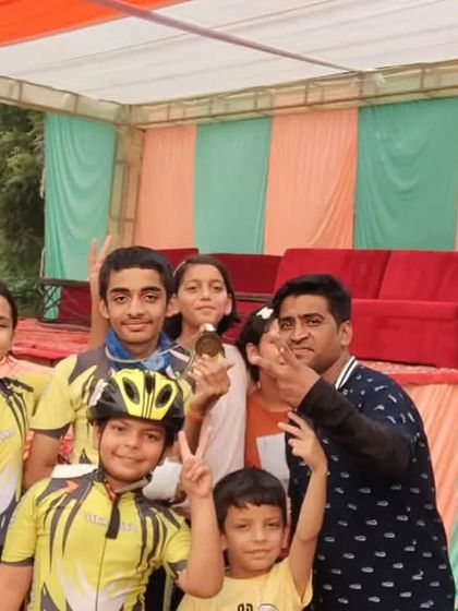 A duplicate of media ID 102, showing Nirvikar Bajpai and his family celebrating his win at the Roller Skating State Championship.