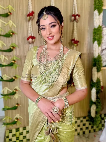 A full portrait showing the complete Vratham look, exuding grace and tradition.