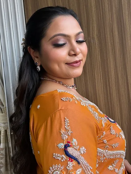 A detailed shot of the Lagan Lakhan makeup, showing the blended eyeshadow and radiant skin finish that ensures the bride looks perfect from every angle.