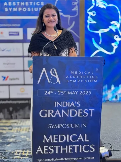 A confident stance at the lectern during the medical conference, ready to introduce the next speaker.