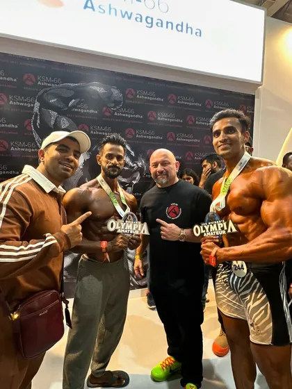 Standing with the legendary coach Hany Rambod and my Olympia-winning athletes. Being recognized among the best in the world is a testament to the world-class preparation my team provides.