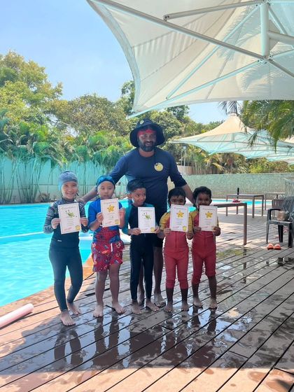 Nisha Millet Swimming Academy - Swimming Lessons Our Program: From Tadpole to Marlin photo 26
