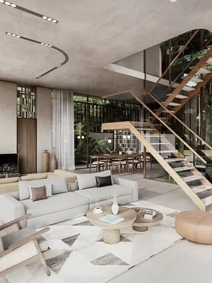 This living area in our Pavilions in the Fields project is centered around an internal courtyard and staircase. The design uses warm textures and minimal furniture to keep the focus on the expansive views of the surrounding paddy fields.