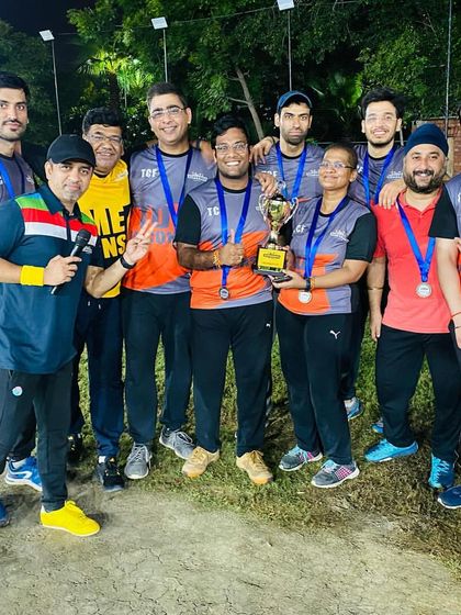 The winning team, EYP TSE Gladiators, posing with the championship trophy. Moments like these are what teams play for in our adult cricket leagues.