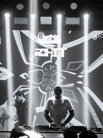 A black and white shot of me at the console, silhouetted by the stage lights.