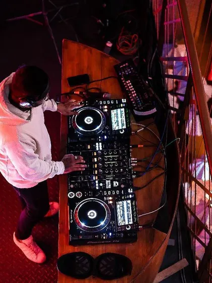 An overhead shot of me working the decks at The Fixx in Koramangala. This is one of my favorite spots to play a mix of hip hop and commercial tracks.