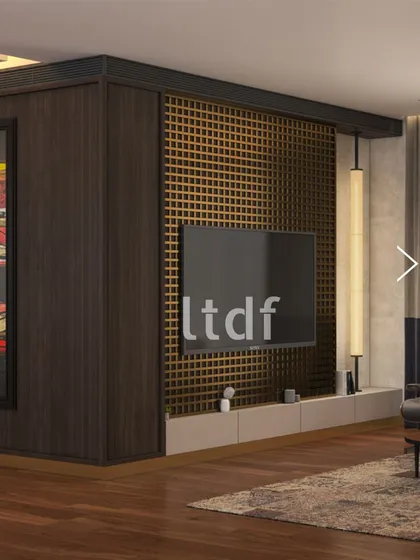A detail of the media wall, where a wooden lattice panel adds texture and visual interest, concealing the television when not in use. This approach integrates technology seamlessly into the design, maintaining the room's clean and sophisticated aesthetic.