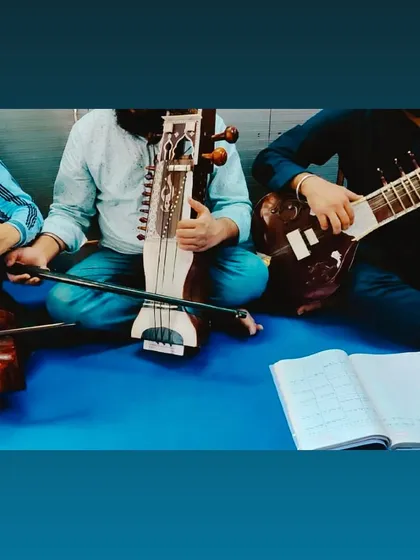 We believe in the power of ensemble music. Here, our students are practicing with a Dilruba, Sarangi, and Sitar, demonstrating the beautiful harmony our various string instruments can create together.