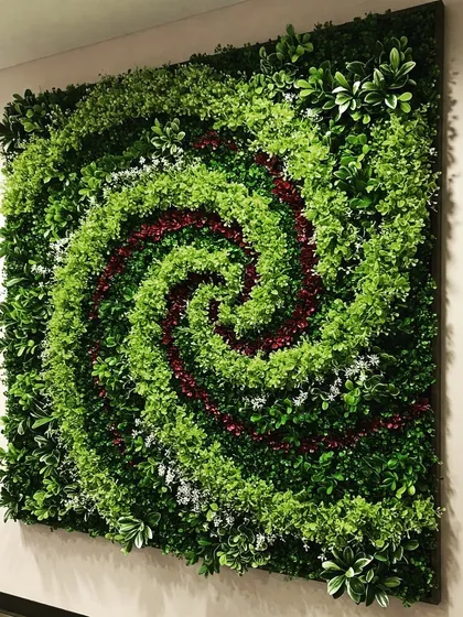 A highly artistic vertical garden design. We created a spiral pattern using different colored plants, turning a simple wall into a unique piece of custom art.