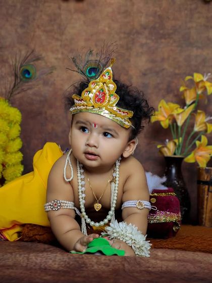 Our little Krishna crawling towards the pot of butter. We create dynamic and playful scenes that bring the stories of Krishna to life.