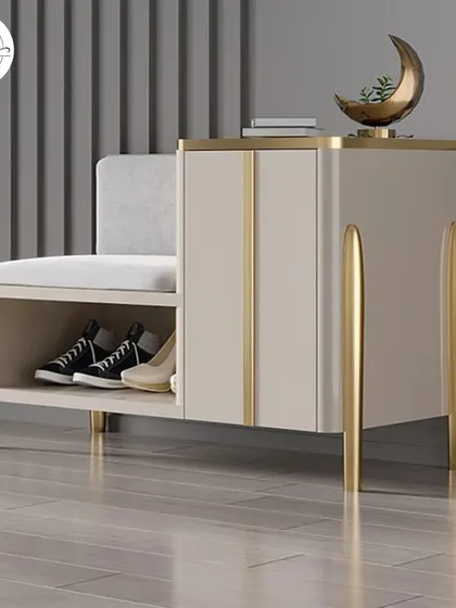 A shoe storage unit that includes a comfortable seating bench. This design is perfect for entryways, allowing you to sit while putting on or taking off shoes, with storage neatly tucked away.