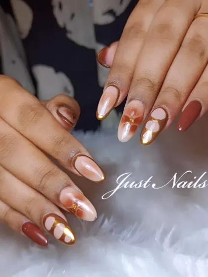 An artistic design in earthy tones. This set features a mix of solid brown and abstract floral patterns with gold chrome accents.