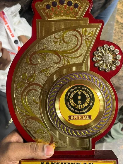 A close up of the official Sanshinkan International trophy. This is the standard of excellence we strive for in every competition.