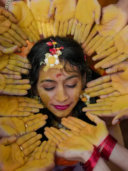 The Haldi ceremony is all about vibrant joy. For Chandana, I used waterproof makeup and a bright lip color that stayed put through all the festivities, complementing her beautiful floral jewelry.