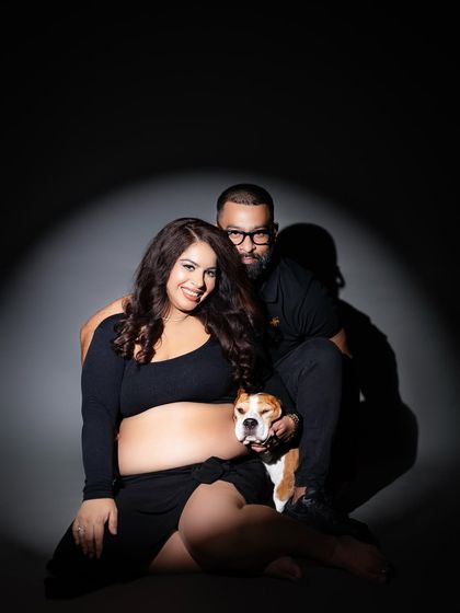 Pets are family too. I love it when clients bring their furry friends along for a maternity session, like this adorable portrait with their dog.